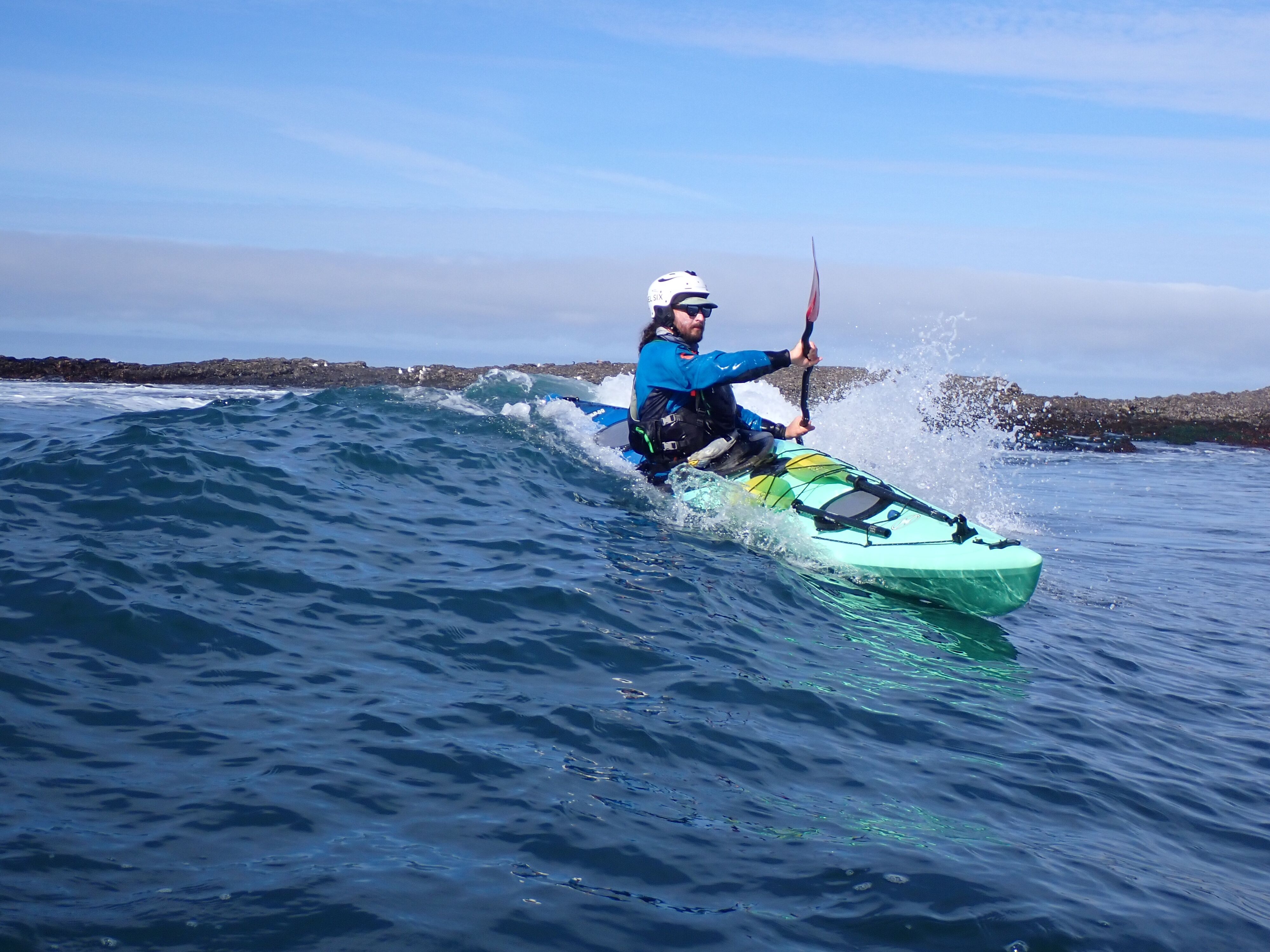 hydra touring kayak action photo surfing a wave